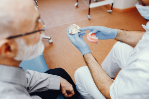 Dental Implants vs Dentures vs Bridges